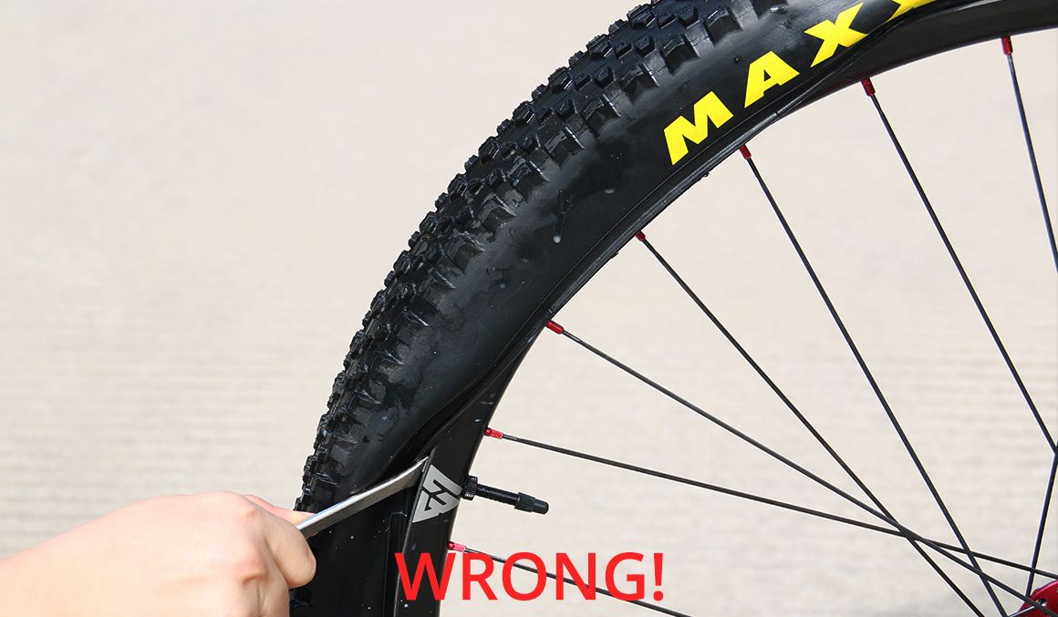 how-to-install-a-tight-tubeless-Maxxis-tire-mistakes-for-air-leak.jpeg